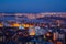 Aerial view of night Voronezh downtown. Voronezh cityscape at blue hour. Houses, churches and Voronezh river from high rooftop