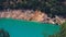 Aerial view of the Noguera Ribagorzana river with a cloudy blue sky in the background, Spain