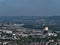 Aerial view of the north of city Koblenz with Rhine river and inland port with tanks and industrial buildings.