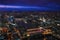 Aerial view of north east part of London, in evening. St Pauls Cathedral visible over river Thames