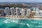 Aerial view of North Miami Beach skyscrapers with sun and clouds