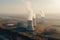 Aerial view of nuclear power plant with smoking chimneys at sunrise, Nuclear power plant aerial view with smoke, AI Generated