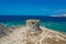 Aerial view of nuraghe in a island in Mediterranean sea next to Sardinia coast