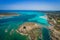 Aerial view of nuraghe in a island in Mediterranean sea next to Sardinia coast