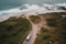 Aerial view ocean coast and recreational vehicle