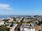 Aerial view on Odessa city centre - houses, Black sea, port and dockyard