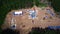 Aerial view of oil gas drilling tower in forest