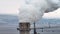 Aerial view of oil and gas petrochemical base industry and oil refinery at sunset in cloudy weather. Cinematic wide