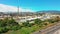 Aerial view. Oil refinery, chemical factory and power plant with many storage tanks and pipelines.