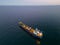 Aerial view oil ship tanker carrier oil on the sea at sunset