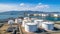 Aerial view oil terminal storage tank, White oil tank storage chemical petroleum petrochemical refinery product at oil terminal,