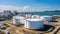 Aerial view oil terminal storage tank, White oil tank storage chemical petroleum petrochemical refinery product at oil terminal,