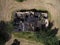 Aerial view of an old abandoned and destroyed farmhouse