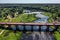 Aerial view of an old bridge across the Venta river in Kuldiga, Latvia