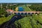 Aerial view of an old bridge across the Venta river in Kuldiga, Latvia