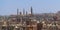 Aerial view of old Cairo, Egypt with grunge buildings and Sultan Hasan Mosque in far distance