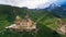 aerial view of old castle in green cloudy