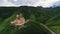 aerial view of old castle in green cloudy