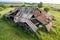 aerial view of an old collapsed barn before restoration
