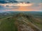 Aerial view of the old Enisala stronghold citadel standing on the hill in the sunset