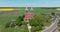 aerial view on old new red bricks gothic temple or catholic church in countryside