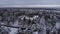 Aerial view of an old soviet school in a small town on a winter day