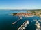 Aerial view of old town Izola in Slovenia, cityscape with marina at sunset. Adriatic sea coast, peninsula of Istria, Europe