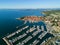 Aerial view of old town Izola in Slovenia, seascape with marina at sunset. Adriatic sea coast, peninsula of Istria, Europe