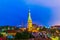 Aerial view of the old town of Tallin dominated by Saint Olaf church during night, estonia....IMAGE