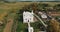 aerial view on old white temple or catholic church in classicism style with columns in countryside