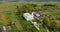 aerial view on old white temple or catholic church in countryside