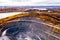 Aerial view of opencast mining of iron ore. Environmental pollution problems