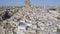 Aerial view of Ortahisar town old houses in rock formations.