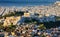 Aerial view over Athens with te Acropolis and harbour from Lycabettus hill, Greece at sunrise