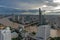 Aerial view over Bangkok modern office building in Bangkok business zone near the river with sunset sky