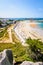 Aerial view over the beach of Greve Blanche in Tregastel, France, on a sunny summer day