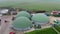 Aerial view over biogas production plant. Obtaining biogas biomethane