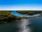 Aerial view over the calm waters in Oyster Bay near Lloyd Harbor, New York on a sunny day