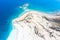 Aerial view over the clear beach and turquoise water of Salda lake. Burdur Province, Turkey