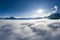 Aerial view over cloud bank to tirol mountain alps