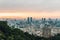 Aerial view over Downtown Taipei with layers of mountain in background in the dusk from Xiangshan Elephant Mountain in the evening