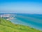 Aerial view over Eastbourne seafront from the South Downs near Beachy Head, England, UK.