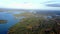 Aerial view over the finnish archipelago full of islands. Aerial footage of a woodland and sea at Aland Islands