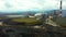 Aerial view over industrialized city with air atmosphere and river water pollution from metallurgical plant near sea