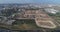 Aerial view over Israel open fields with traffic roads and agriculture view. Panoramic wide view over agronomy and