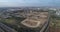 Aerial view over Israel open fields with traffic roads and agriculture view. Panoramic wide view over agronomy and