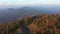 Aerial view over Italian hills with mist and clouds