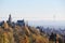 Aerial view over Kronberg with the castle and old town of Frankfurt in the fog in autumn