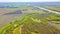 Aerial view over landscape vegetation, forest trees next to the river Tisza