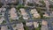 Aerial view over residential suburban city streets, Santa Clarita, California